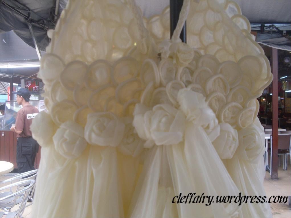 The back of the dress. The back of the condom dress is also prettily crafted.