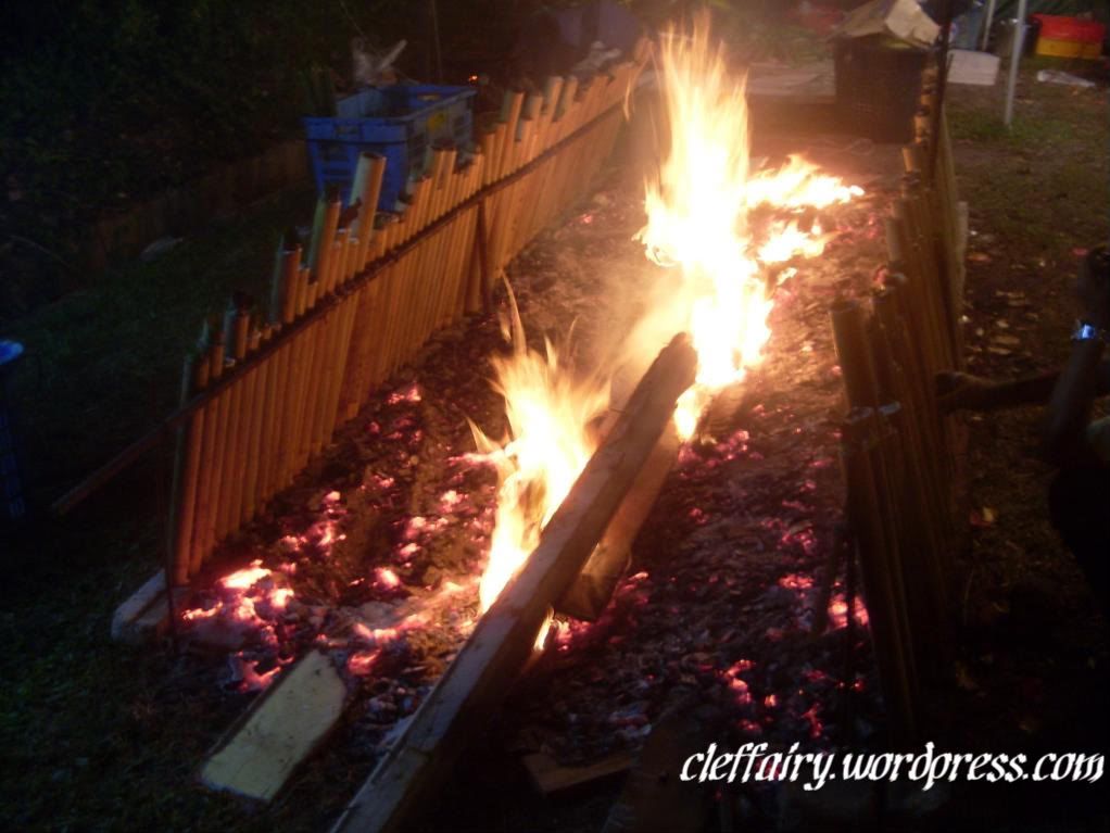 Lemang Lemang, placed at the huge open fire to be cooked to perfection