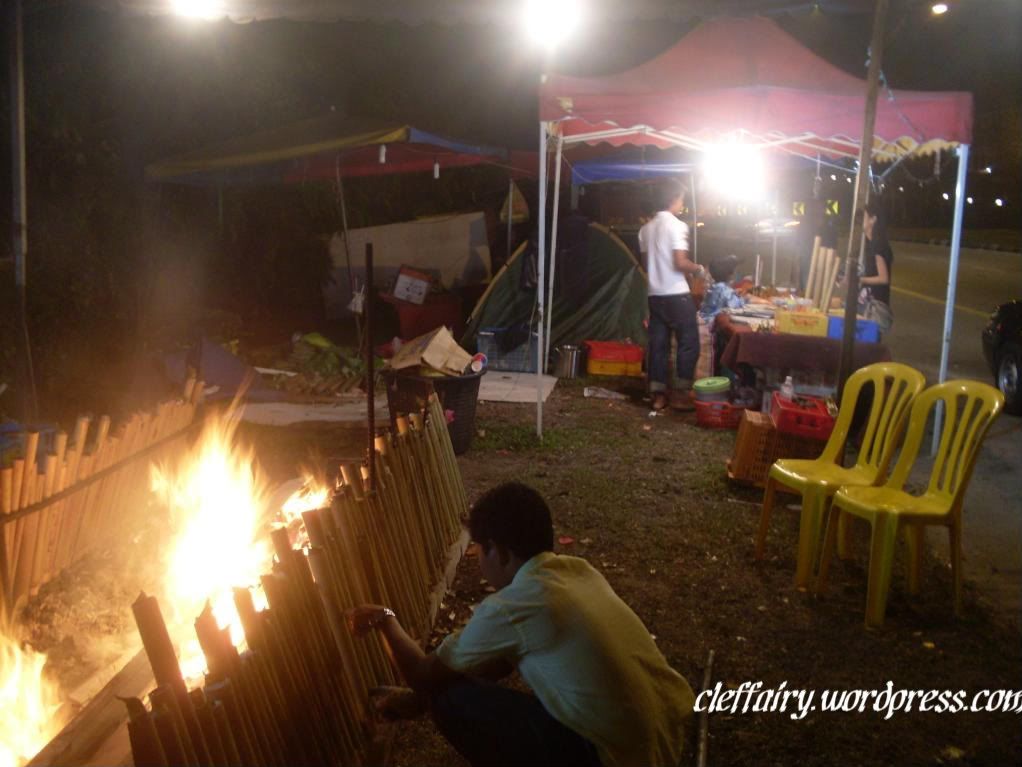 Lemang 2 To evenly cook the lemang, one would need to watch over it and constantly rotate the bamboo.